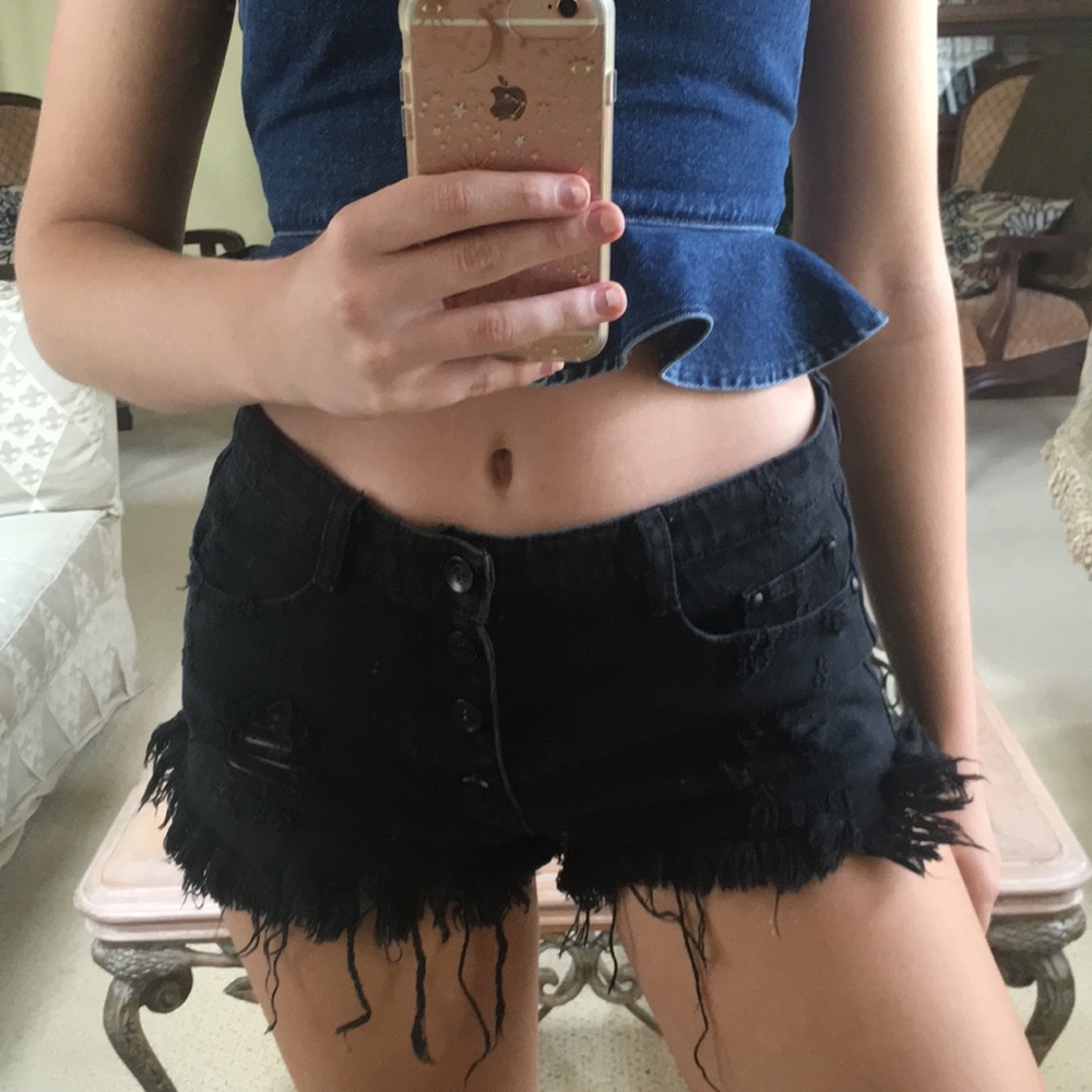 Brandy Melville black distressed shorts